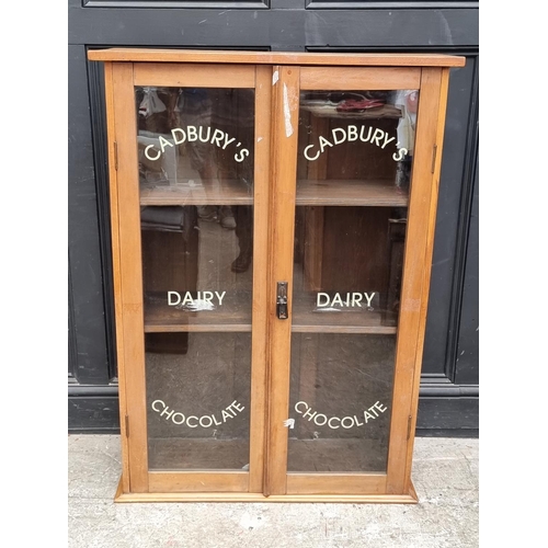 1005 - A walnut bookcase, 85cm wide.