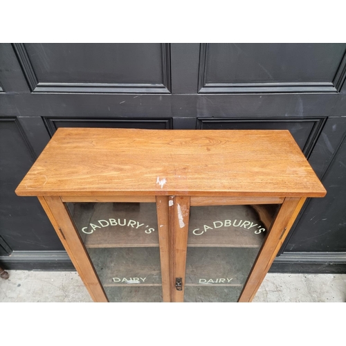 1005 - A walnut bookcase, 85cm wide.