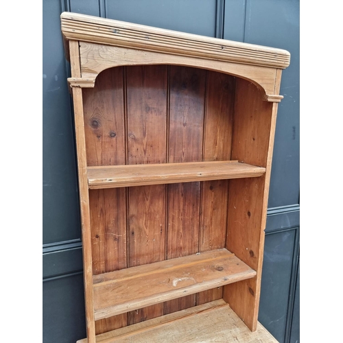 1009 - A pine cabinet, 77.5cm wide.