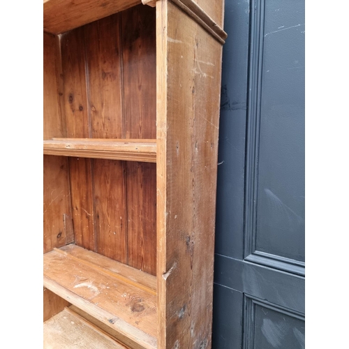 1009 - A pine cabinet, 77.5cm wide.