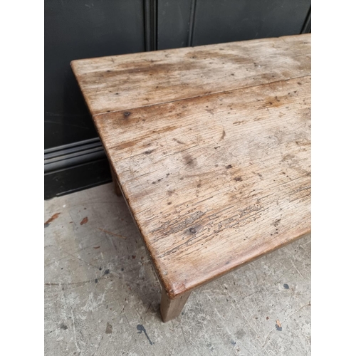 1012 - An old walnut rectangular low occasional table, 107.5cm wide.