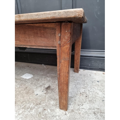 1012 - An old walnut rectangular low occasional table, 107.5cm wide.