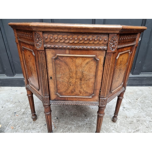 1017 - An unusual antique continental walnut corner cupboard, 88cm wide.