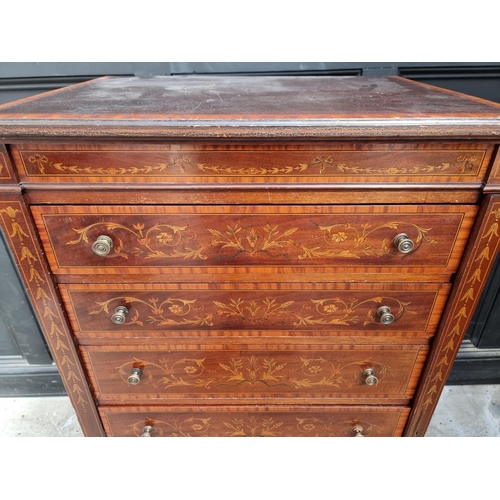 1021 - A late Victorian mahogany and inlaid Wellington chest, in the manner of Edwards & Roberts, ... 