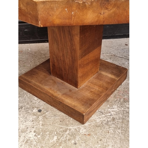 1023 - An Art Deco burr walnut octagonal low table, 58.5cm wide.