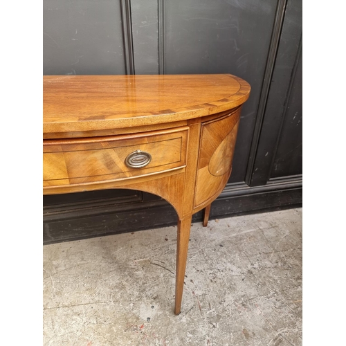 1024 - A small circa 1900 mahogany, crossbanded and line inlaid demi-lune sideboard, 113.5cm wide.... 