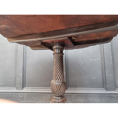 1036 - A George III mahogany piecrust tilt top tripod table, 86cm wide.