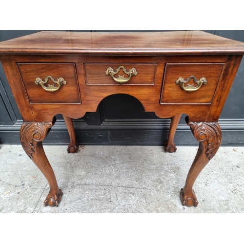 1040 - A George I/II mahogany lowboy, 77cm wide.