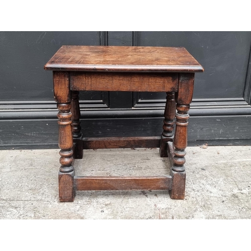 1042 - An oak joint stool, 44.5cm wide.