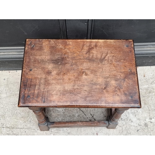 1042 - An oak joint stool, 44.5cm wide.