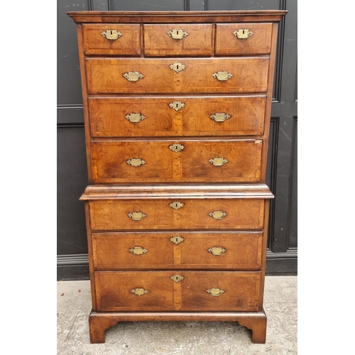 1043 - A George I/II walnut and feather banded chest on chest, 97.5cm wide.