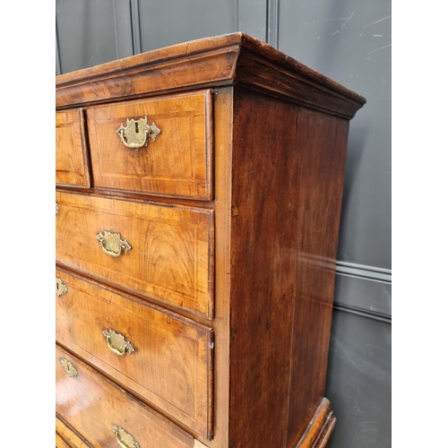 1043 - A George I/II walnut and feather banded chest on chest, 97.5cm wide.