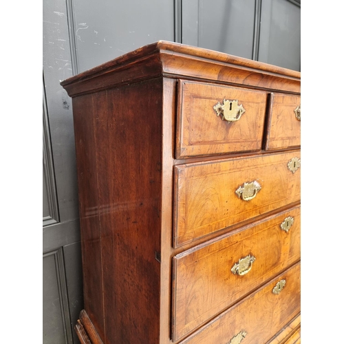 1043 - A George I/II walnut and feather banded chest on chest, 97.5cm wide.