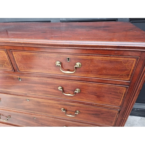 1044 - A George III mahogany and line inlaid chest of drawers, 133cm wide.