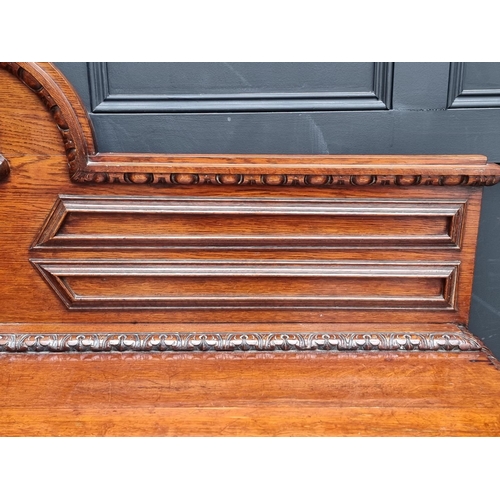 1046 - A large late 19th century Flemish carved oak sideboard, 164cm wide.