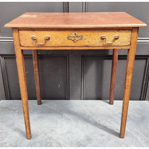 1047 - A George III oak single drawer side table, 66cm wide.