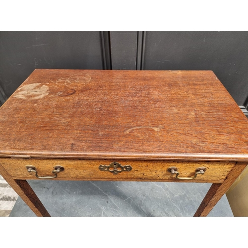 1047 - A George III oak single drawer side table, 66cm wide.