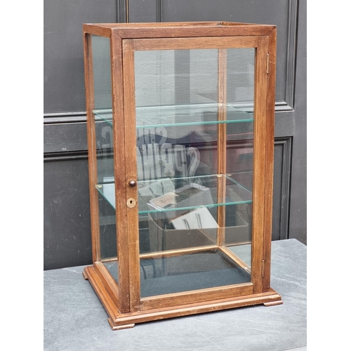 1049 - A small antique oak and bevelled glass table top display case, 62cm high x 31cm wide x 29.5cm d... 