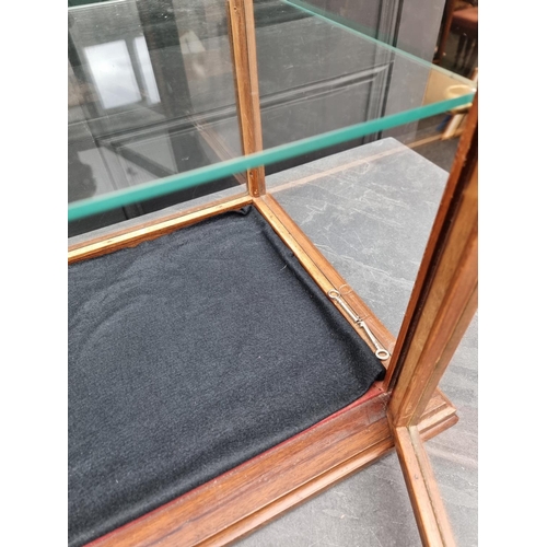 1049 - A small antique oak and bevelled glass table top display case, 62cm high x 31cm wide x 29.5cm d... 