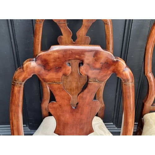 1053 - A set of four 18th century Swedish walnut dining chairs.