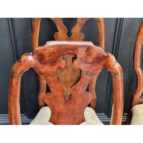 1053 - A set of four 18th century Swedish walnut dining chairs.