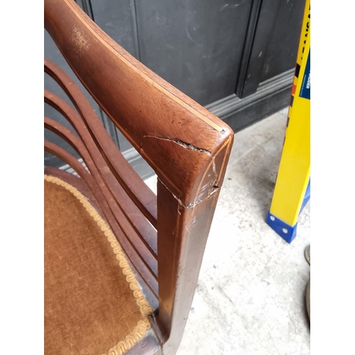 1059 - A circa 1900 mahogany and inlaid salon tub chair.