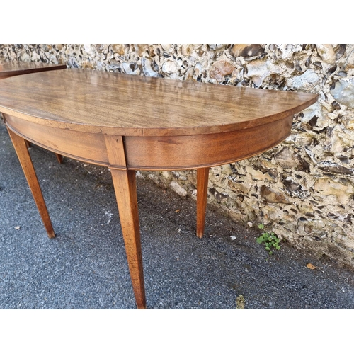 1070 - A pair of early 19th century mahogany console tables, 125.5cm wide; together with additional le... 