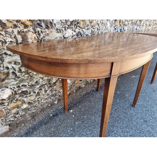 1070 - A pair of early 19th century mahogany console tables, 125.5cm wide; together with additional le... 