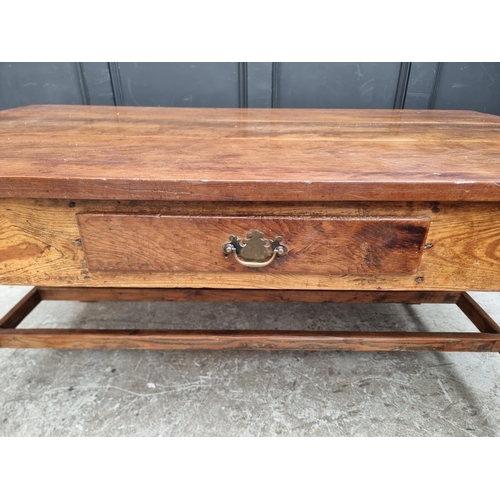 1072 - An old yew and pitch pine kitchen table, with frieze drawer, 153cm wide.