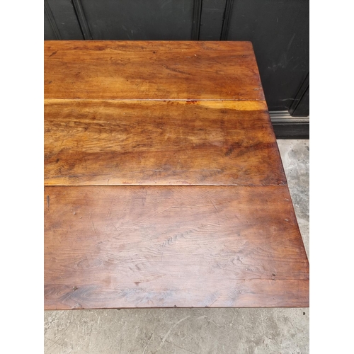 1072 - An old yew and pitch pine kitchen table, with frieze drawer, 153cm wide.