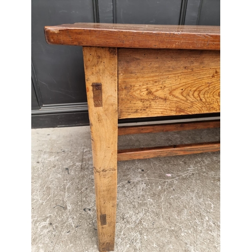 1072 - An old yew and pitch pine kitchen table, with frieze drawer, 153cm wide.