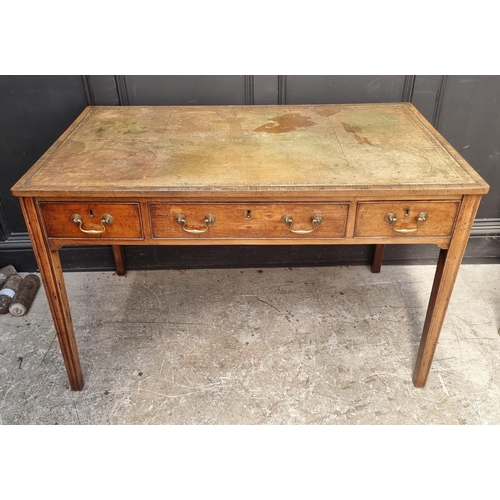 1074 - A George III mahogany desk, with green tooled leather inset surface, 119.5cm wide.... 