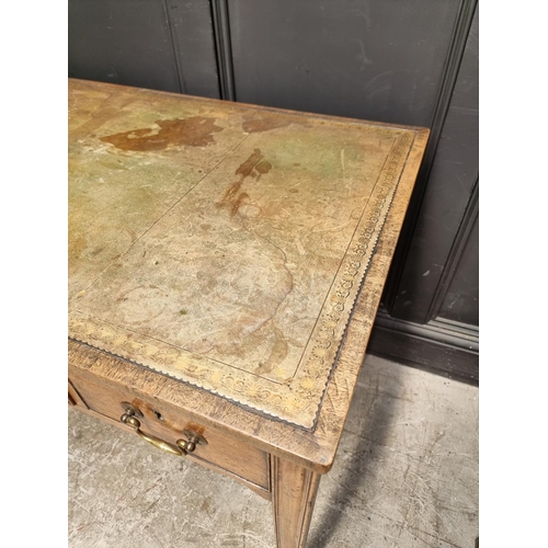 1074 - A George III mahogany desk, with green tooled leather inset surface, 119.5cm wide.... 