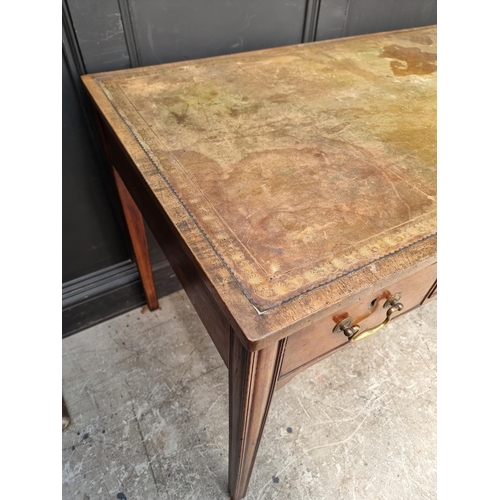 1074 - A George III mahogany desk, with green tooled leather inset surface, 119.5cm wide.... 