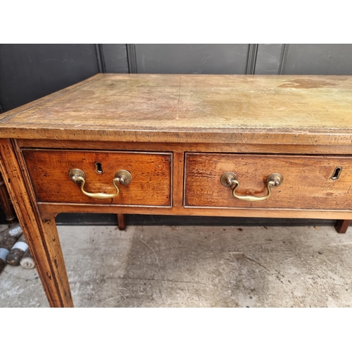 1074 - A George III mahogany desk, with green tooled leather inset surface, 119.5cm wide.... 