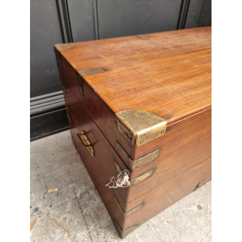 1077 - A late 19th century teak and brass bound chest, 94cm wide.