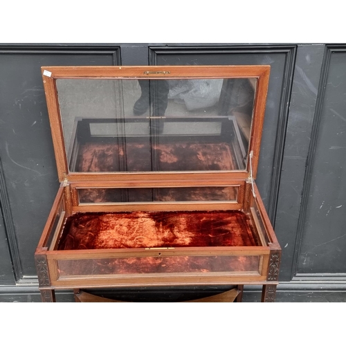 1079 - A 19th century mahogany blind fret bijouterie table, 74.5cm wide.