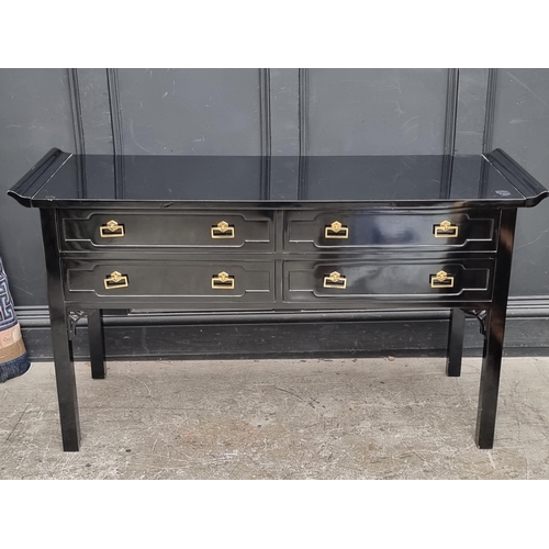 1083 - A Chinese style black lacquered altar table, 138cm wide.