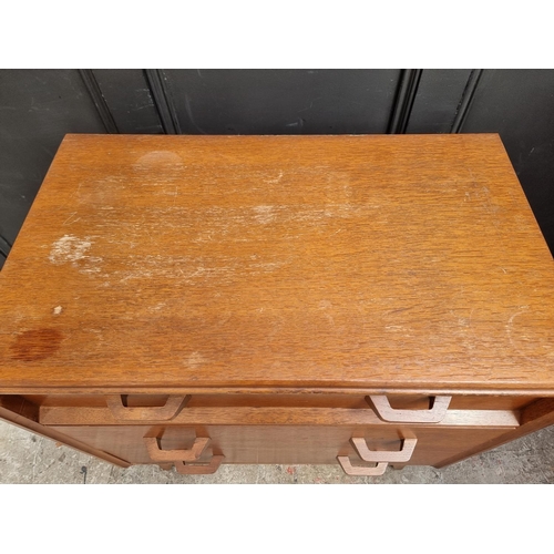 1087 - A mid-century G Plan oak chest of drawers, 76.5cm wide.