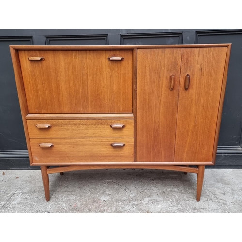 1089 - A mid-century G Plan teak side cabinet, 129.5cm wide.