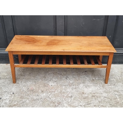 1090 - A mid-century teak rectangular low occasional table, labelled 'Herbert E Gibbs', 106.5cm wide.... 