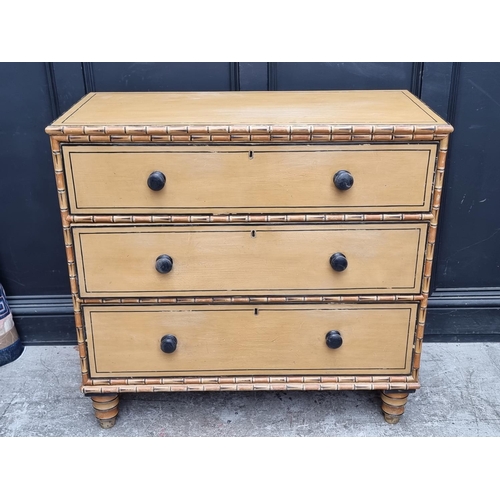 1091 - A 19th century painted pine and simulated bamboo chest of drawers, 101.5cm wide.