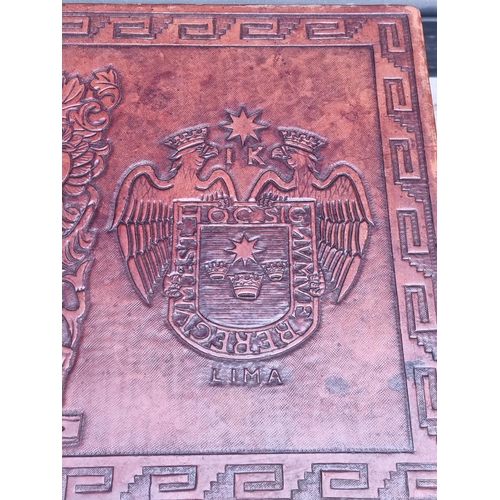 1095 - A Peruvian mahogany and embossed leather rectangular low occasional table, probably by Angel Pazmino... 