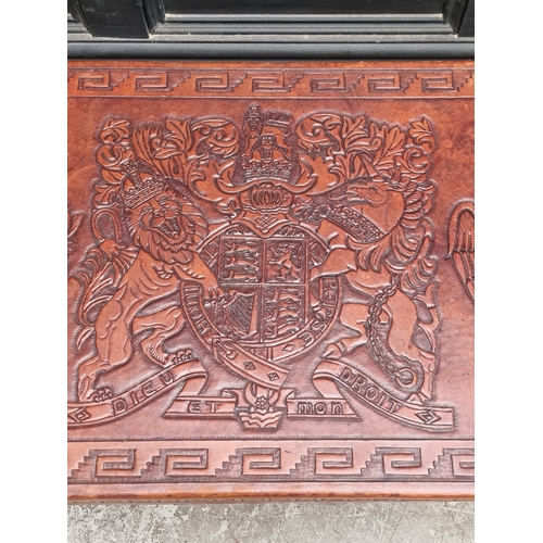 1095 - A Peruvian mahogany and embossed leather rectangular low occasional table, probably by Angel Pazmino... 