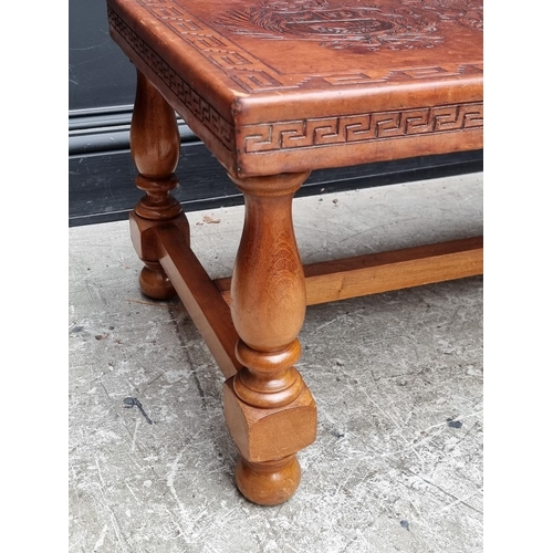 1095 - A Peruvian mahogany and embossed leather rectangular low occasional table, probably by Angel Pazmino... 