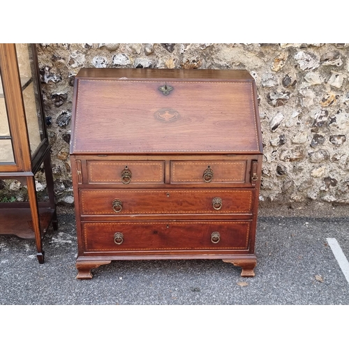 1104 - A small Edwardian mahogany and line inlaid bureau, 76cm wide; together with an Edwardian mahogany an... 