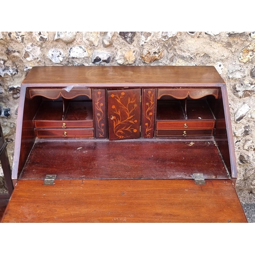 1104 - A small Edwardian mahogany and line inlaid bureau, 76cm wide; together with an Edwardian mahogany an... 