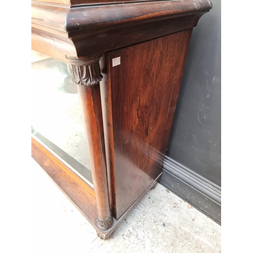 1105 - An early Victorian rosewood pier cabinet, 98cm wide, (lacking superstructure).