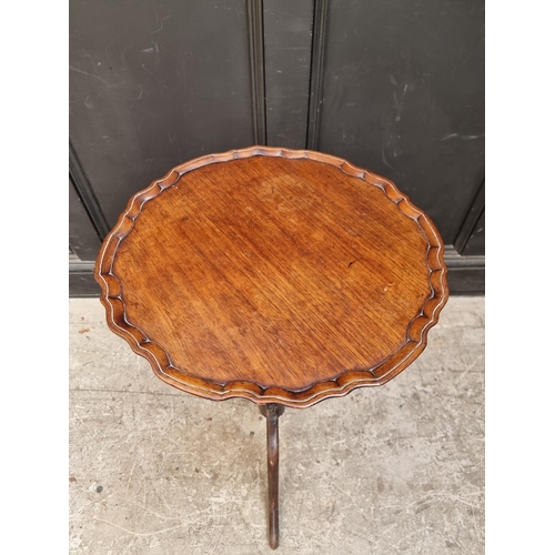 1120 - A small 19th century mahogany piecrust tilt-top tripod table, 46cm diameter.