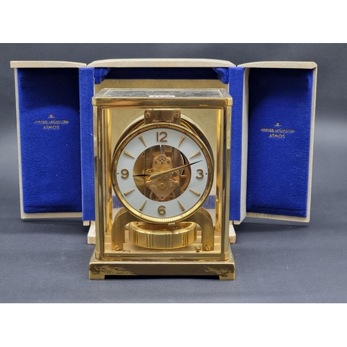 1126 - A Jaeger-LeCoultre brass Atmos clock, serial no. 297490, in original case.